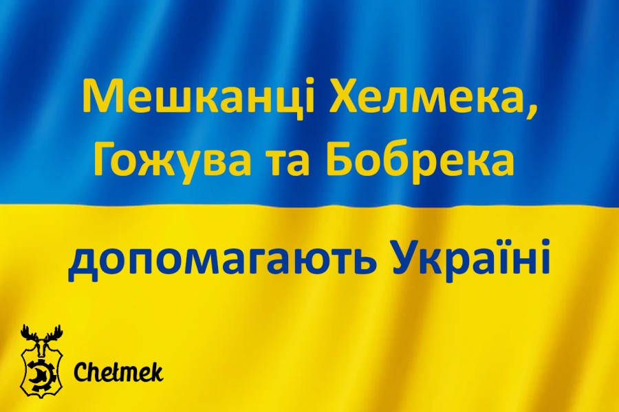 Flaga Ukrainy z napisem w języku ukraińskim: Mieszkańcy Chełmka, Gorzowa i Bobrka pomagają Ukrainie.